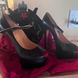 Authentic Christian Louboutin pumps.